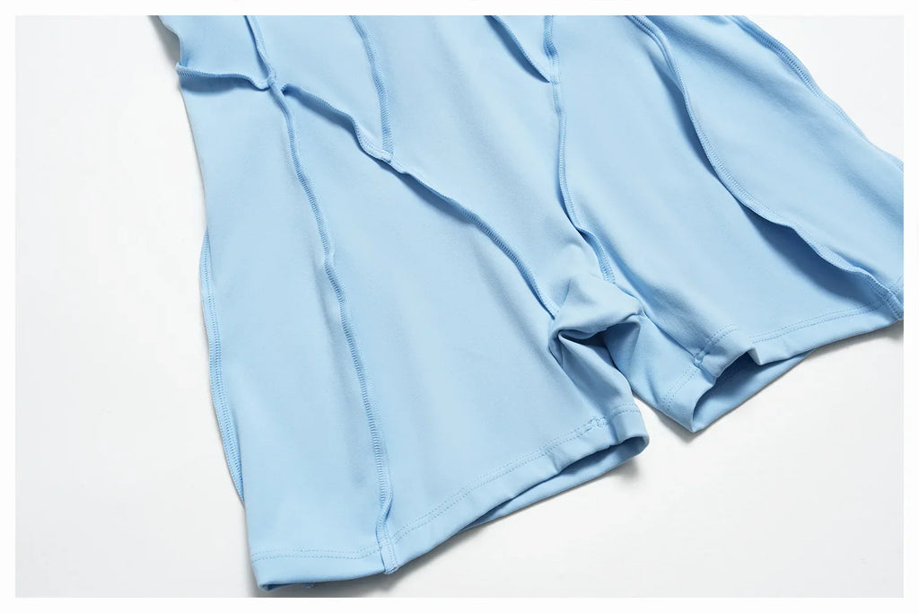 Combinaison de sport à manches courtes pour femme