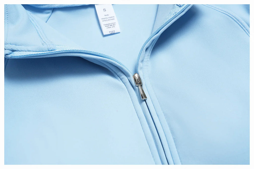 Combinaison de sport à manches courtes pour femme